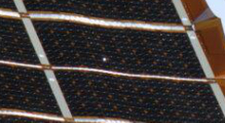 Illustration for article titled Chris Hadfield dodges a 'bullet' as an object pierces ISS solar array